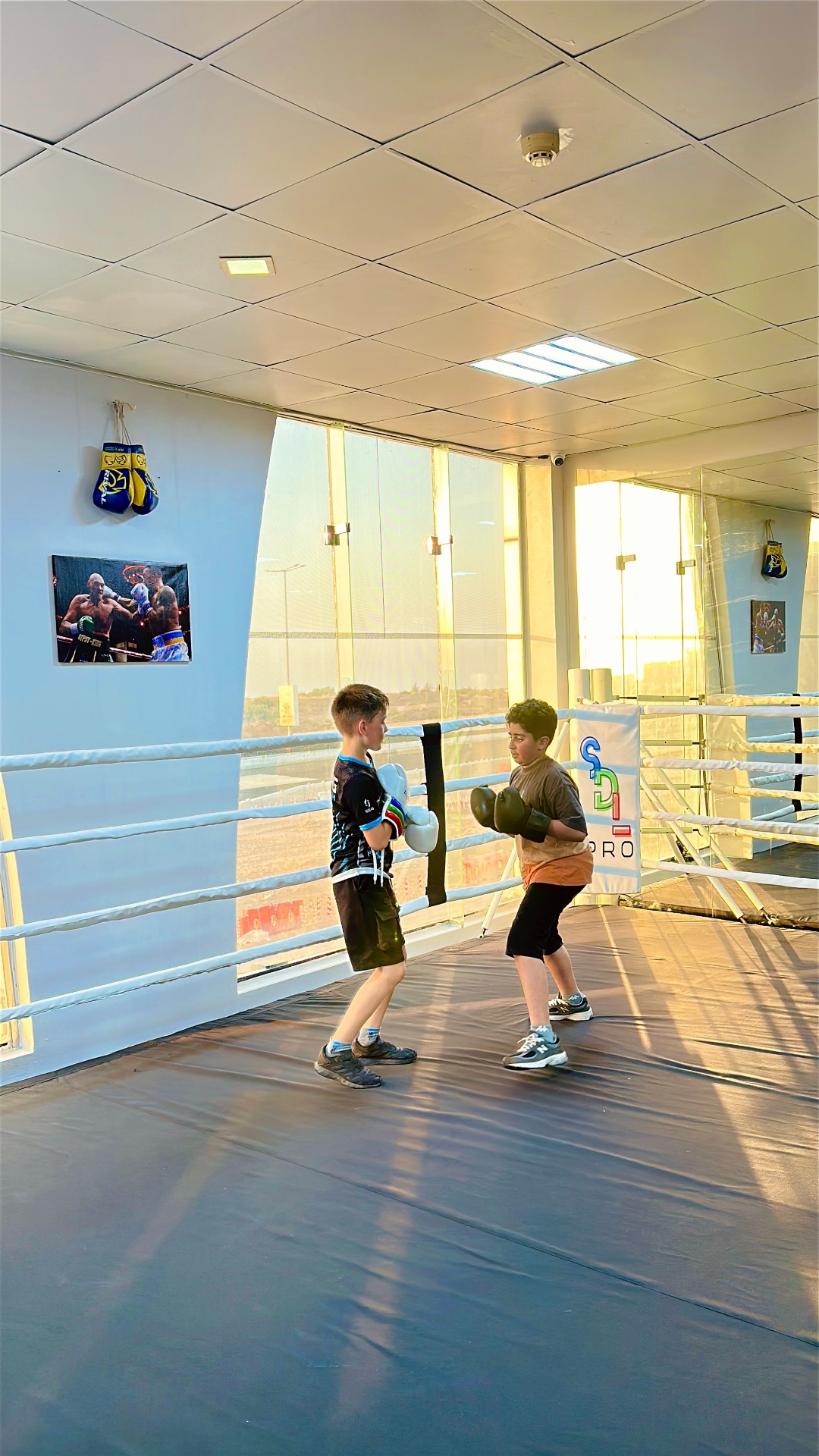 Kids sparring in the Olympic boxing ring